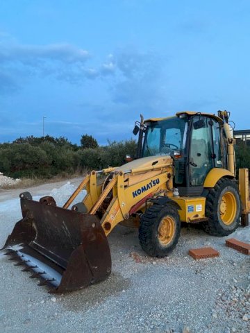 Komatsu WB97R 2008. God.